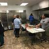 Preparing bake sale items in the new kitchen at the PCCUA-DeWitt campus