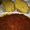 Savory spaghetti with meat sauce and garlic bread