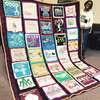 Sherrye and the School Memories quilt she made for her daughter