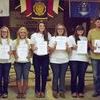 Left to right: Betty Ann Vansandt, Chairman of Arkansas Girls State and Auxiliary Unit 158,  Allie Roush, Emily O’Dell, Carlee Cox, Kyla Patterson, Emily Golden, Lexi Brown, Clayton Briggs, and Johnny Purdy, Post Commander 158.
