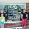 owner Hannah Stubblefield and daughter Maxi, stylist Emmali Wilkins and massage therapist Brandi Fletcher