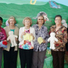 4-H Program Assistant Alta Lockley and Arkansas County EH members Barbara Jones, Sandra Webb, Gladys Hearn, Shirley Fread, Shirley Jackson and Family &amp; Consumer Sciences Agent LaTaaka Harvey standing in front of a very unique mural in the lobby of Arkansas Childrens Hospital Thursday, April 16, 2015.