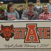 Wyatt Luebke signing his letter of intent to ASU, with his parents Melissa and Kyle Luebke.