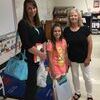 Fifth grade teacher Tessa Clawson is happy to meet her newest student Peighton Maynard and mom Leanne.