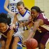 Savannah Patterson fights for possession against Barton