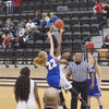 #22 Caitlyn Jones goes up for jump on tip of against Carlisle, as Alana Morgan awaits to grab the ball.