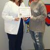 Bailey Jones receives Certificate from Instructor Dawn Watkins
