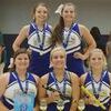 DHS All-American Cheerleaders: Kayla Beth Poor, Carly Watkins, Lexi Brown, Carlee Cox, and Abbey Baker, mascot