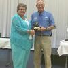 Linda Gunnell receiving the Hunter Education Instructor of the Year Award