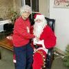Ms. Virginia Place assures Santa that she’s been a good girl all year long.