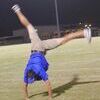 Head Coach Drew Horton, with a surprise perfect cartwheel!