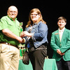 Riley Allen receiving 1st place trophy in Veterinary Science