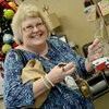 Linda Gunnell grabs a few half price ornaments to finish up her Christmas decorating