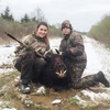Hannah Bishop with Luke Smith with his 320- pound boar hog he killed